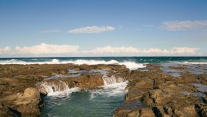 Rocky sea with waves crashing,