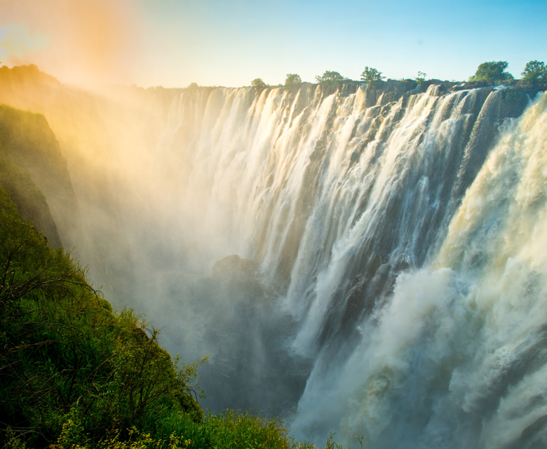 Malawi Grand Tour Sunset Haze Over Victoria Falls