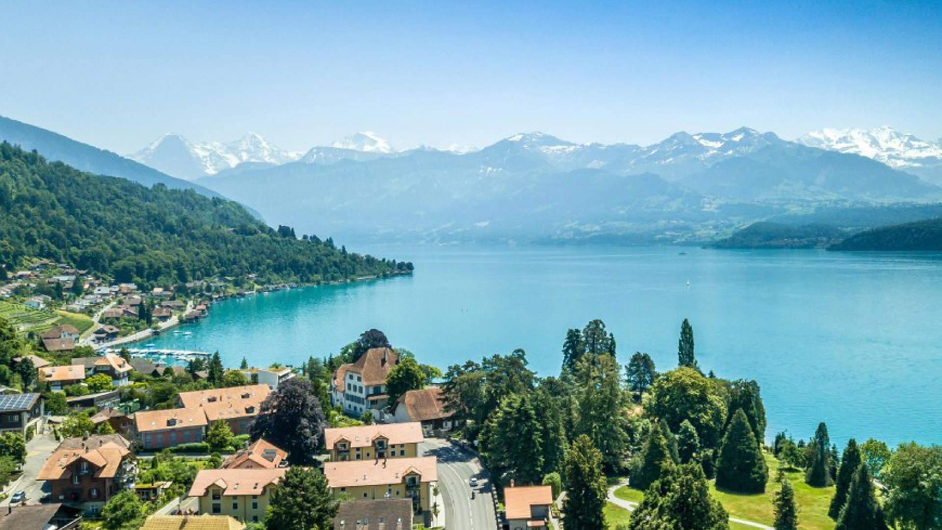 Aerial view of lakeside in Switzerland - Credit: Getty Images / Andreas M