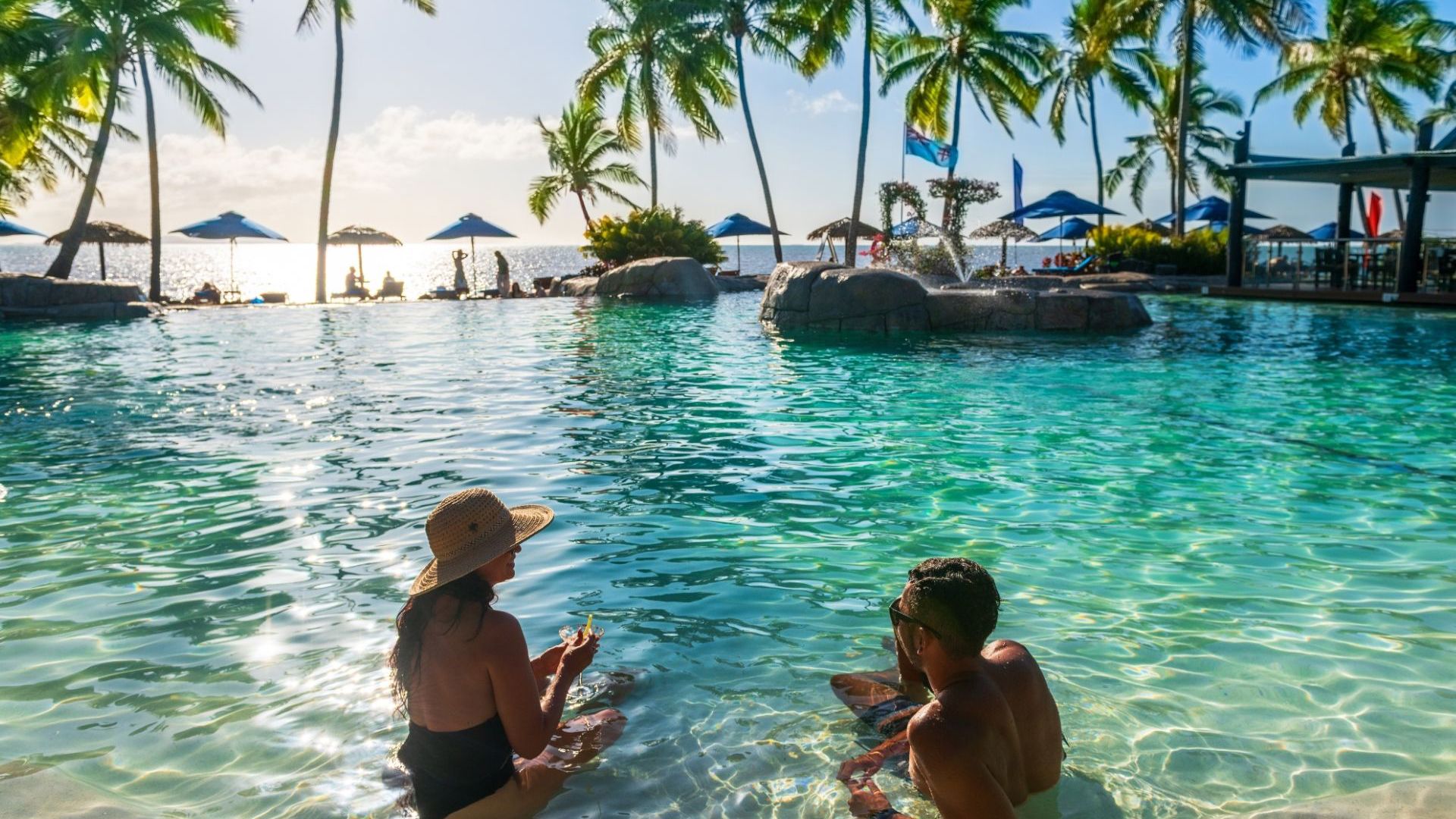 DoubleTree Resort by Hilton Hotel Fiji - Sonaisali Island - couple in pool