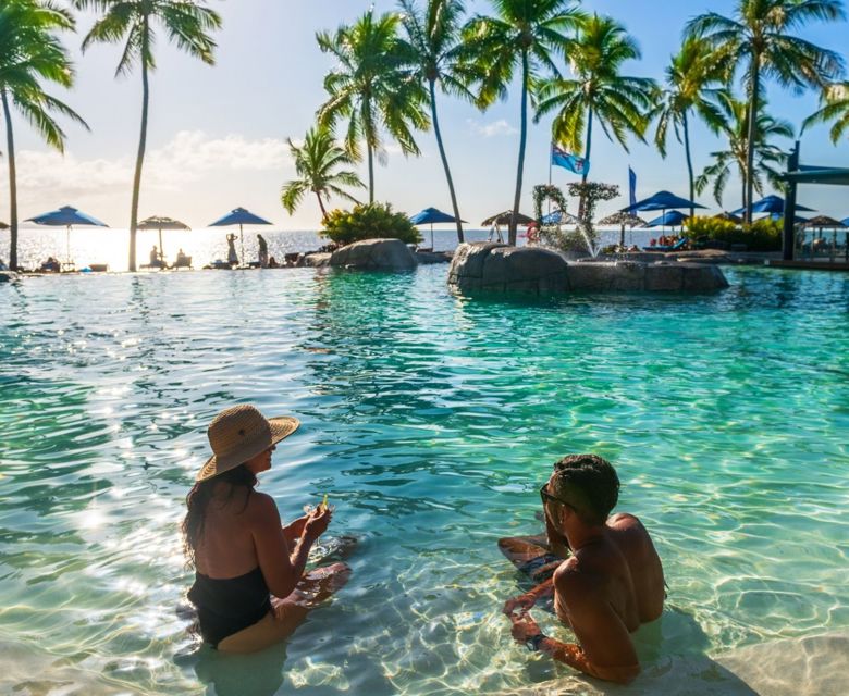 DoubleTree Resort by Hilton Hotel Fiji - Sonaisali Island - couple in pool