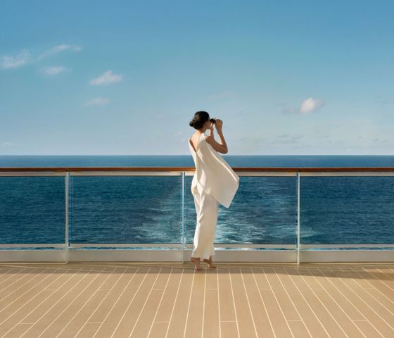 Single Woman with Binoculars ©  Explora Journeys