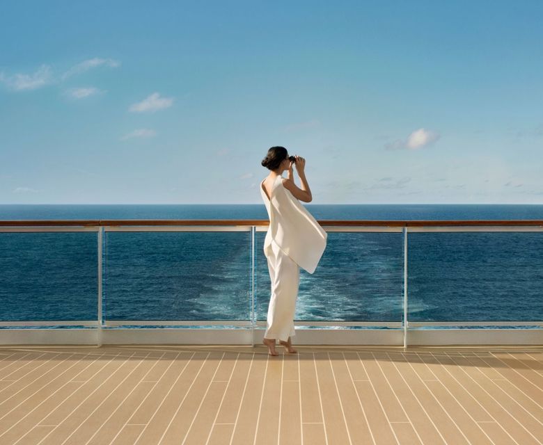 Single Woman with Binoculars ©  Explora Journeys
