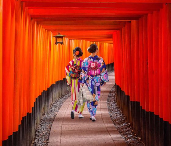 Two women walking in Japan