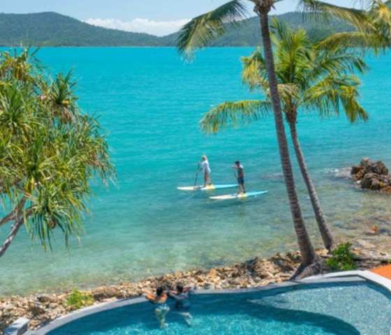 People paddle boarding
