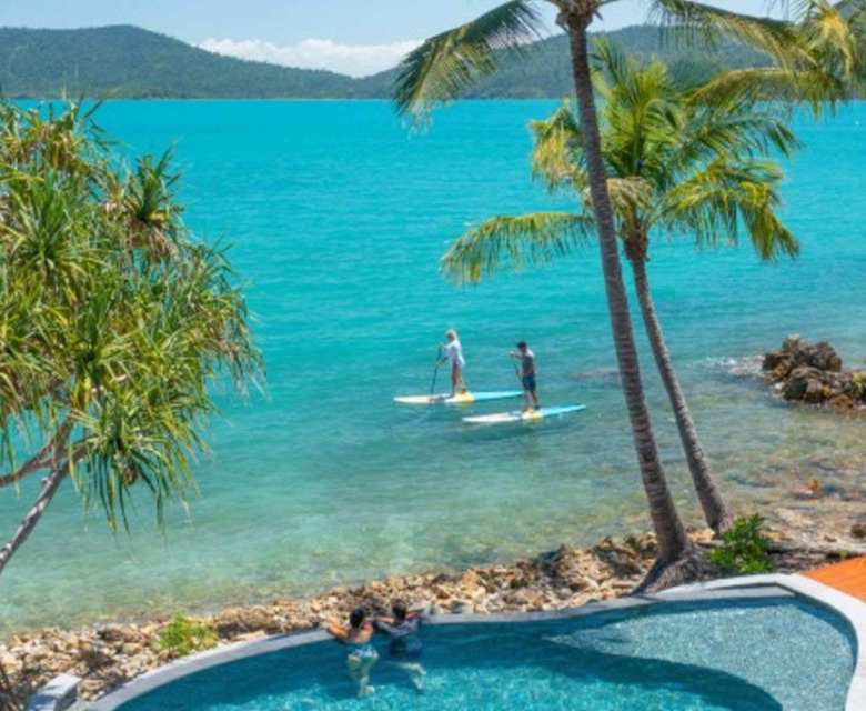 People paddle boarding
