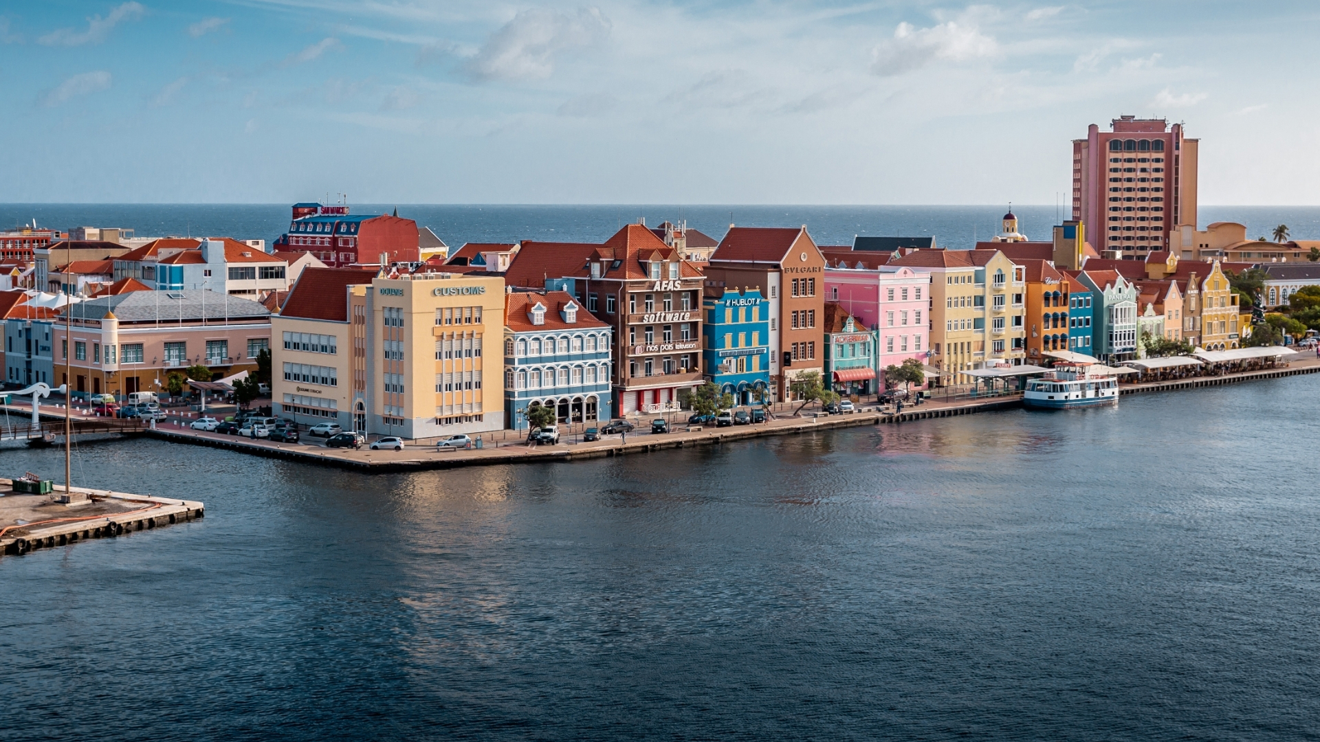 Pastel-coloured buildings and lively waterfront of Punda District - Willemstad, Curaçao