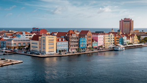 Pastel-coloured buildings and lively waterfront of Punda District - Willemstad, Curaçao