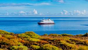MS Santa Cruz II at the coast of San Cristóbal Island, Galápagos Island, Ecuador