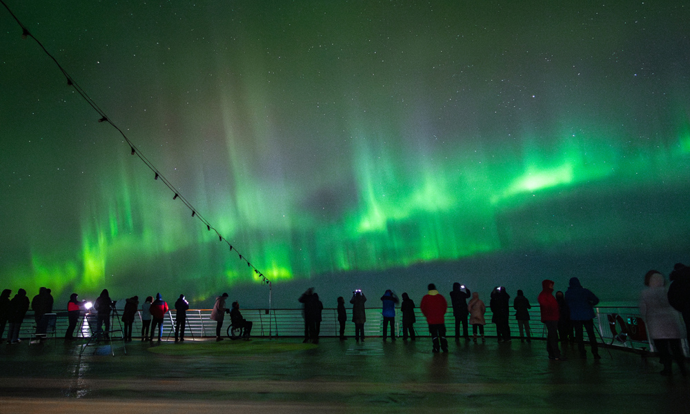 Northern Lights multiple people