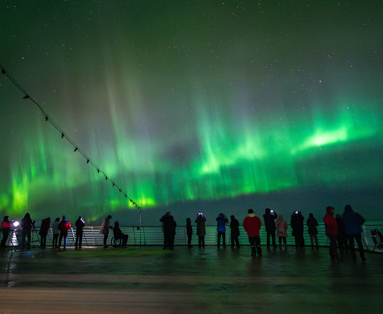 Northern Lights multiple people