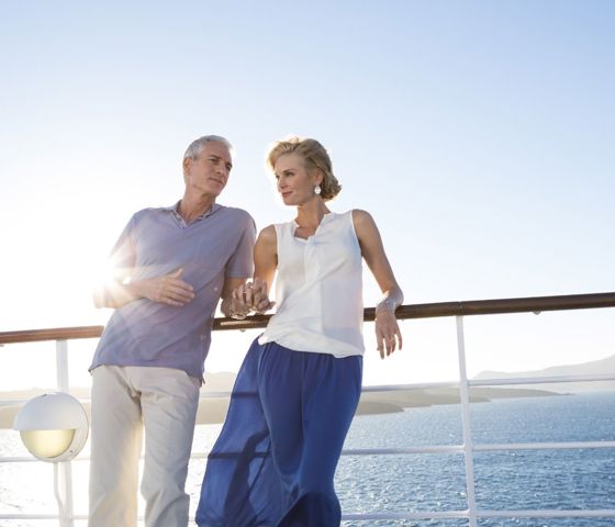 Couple at Railing Sunset © Regent Seven Seas