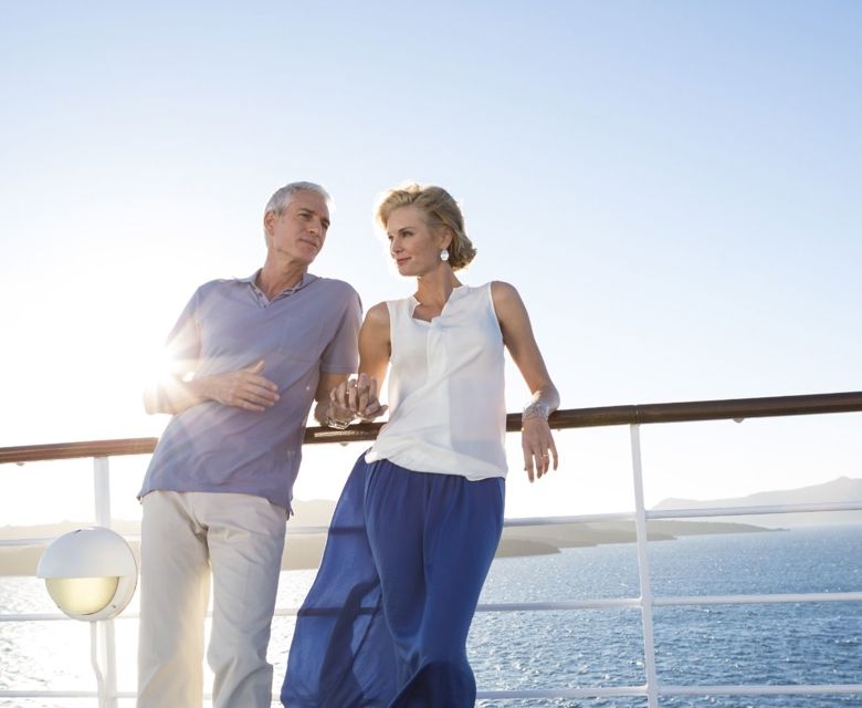 Couple at Railing Sunset © Regent Seven Seas