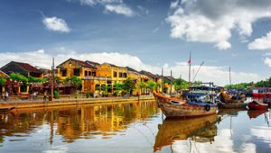 Wooden Boats On The Thu Bon River In Hoi An Ancient Town With Wide Eyed Tours