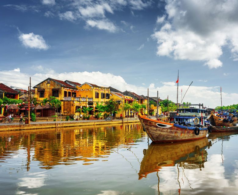 Wooden Boats On The Thu Bon River In Hoi An Ancient Town With Wide Eyed Tours