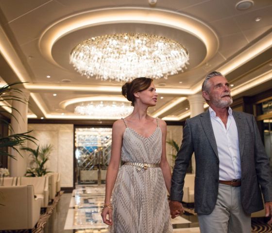 couple in Explorer Atrium © Regent Seven Seas