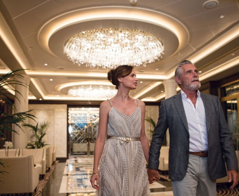 couple in Explorer Atrium © Regent Seven Seas