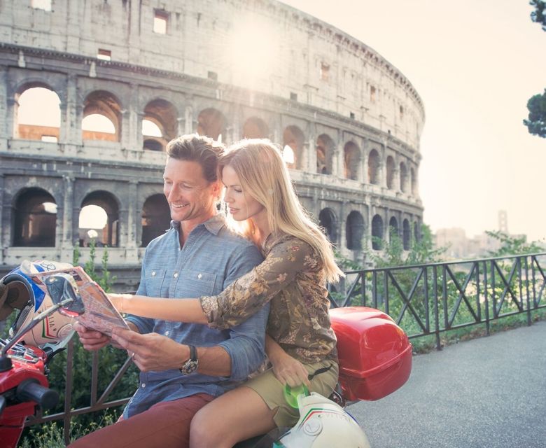 couple in scooter at Colosseum