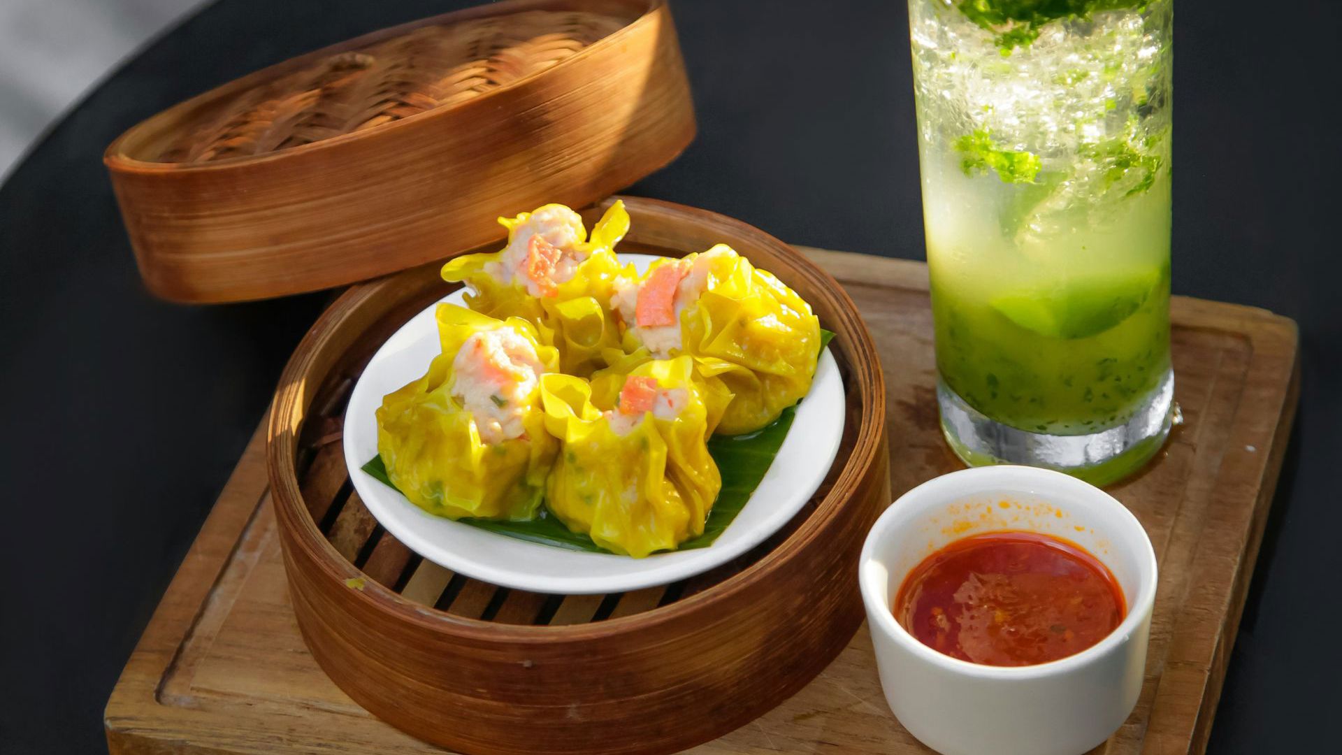 A plate of food with a refreshing drink - Image credit: Unsplash/Abiwin Krisna