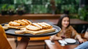 Argentina - Buenos Aires - Empanadas being delivered ad world