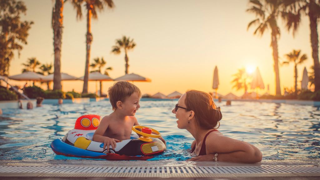 Mother and child in pool