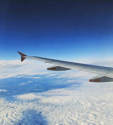 Plane Wing in Sky