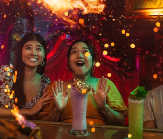 Three people having a drink