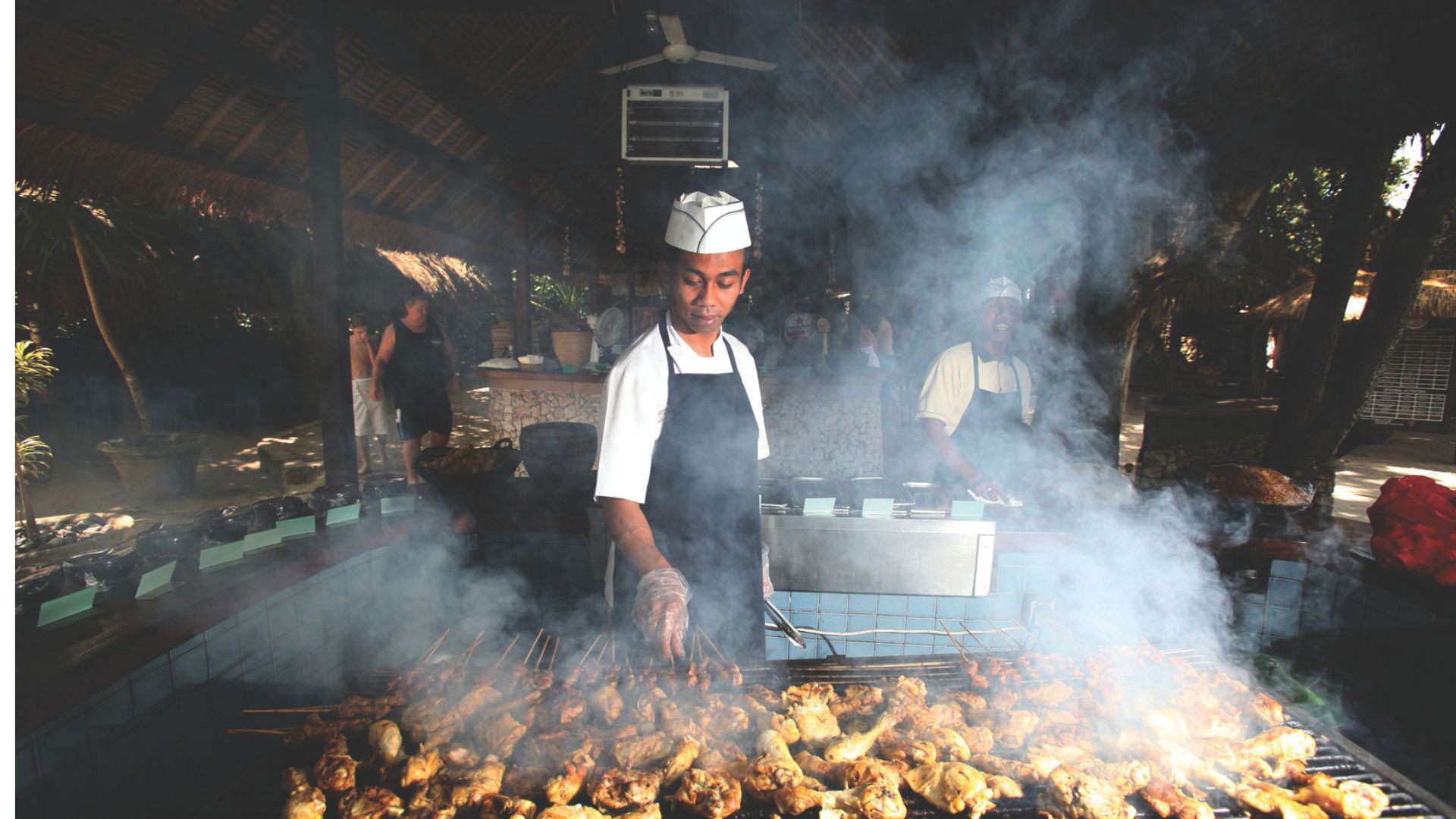 Indulge in a Beach Club BBQ at Nusa Lembongan. Credit: Hai Tide Beach resort
